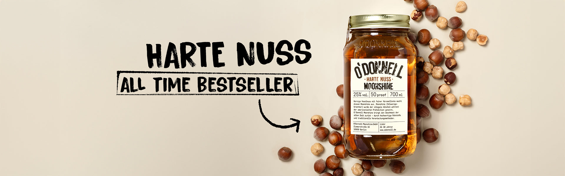 Harte Nuss Moonshine auf cremefarbenem Hintergrund mit dem Text „harte nuss all time bestseller”
