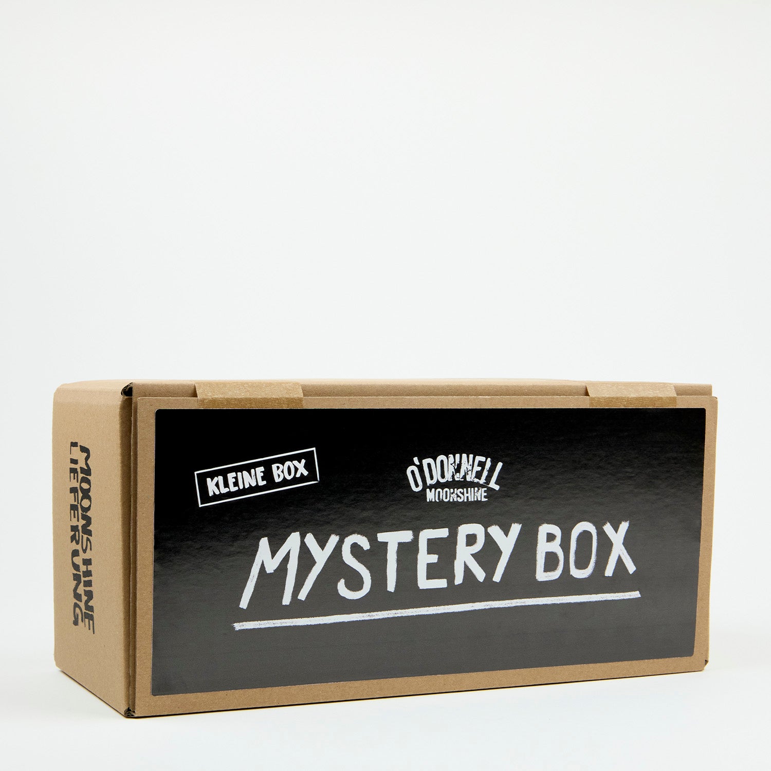Eine Seitenansicht der kleinen Mystery-Box auf weißem Hintergrund.